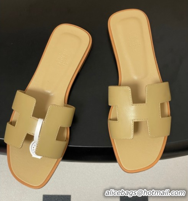 Shop Duplicate Hermes Oran Classic Flat Slides Sandal in Smooth Calfskin Beige 2025 H081803