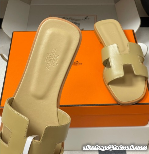 Shop Duplicate Hermes Oran Classic Flat Slides Sandal in Smooth Calfskin Beige 2025 H081803