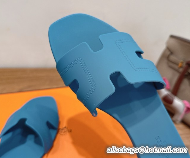 Shop Hermes Oran Classic Flat Slides Sandal in Stitching Rubber Blue 0820192