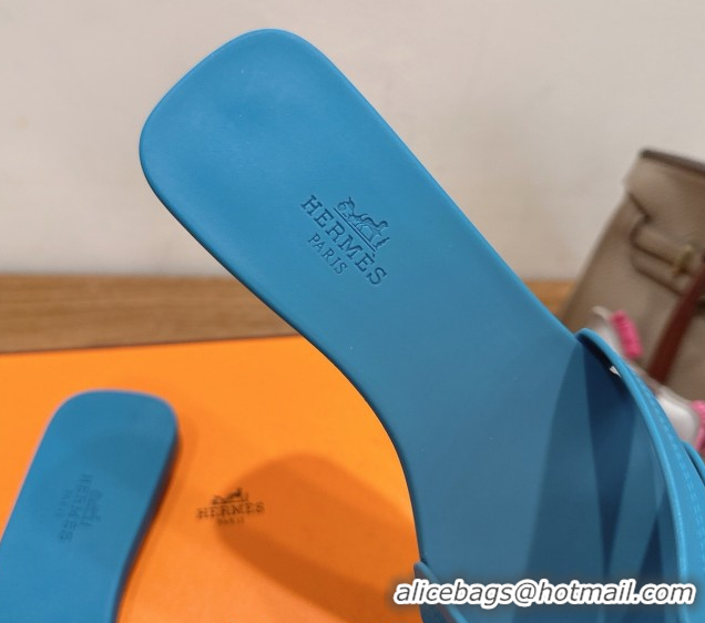 Shop Hermes Oran Classic Flat Slides Sandal in Stitching Rubber Blue 0820192