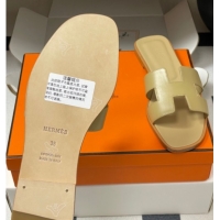 Shop Duplicate Hermes Oran Classic Flat Slides Sandal in Smooth Calfskin Beige 2025 H081803