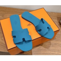 Shop Hermes Oran Classic Flat Slides Sandal in Stitching Rubber Blue 0820192