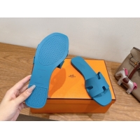 Shop Hermes Oran Classic Flat Slides Sandal in Stitching Rubber Blue 0820192