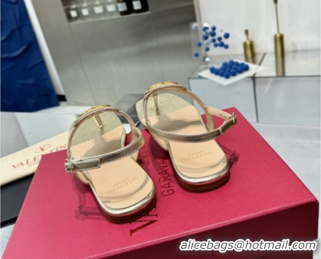 Purchase Valentino Vlogo Signature Flat Thong Sandals in Calfskin Gold 0902054