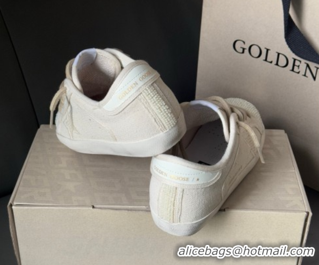 Purchase Golden Goose Super-Star in pearl-colored canvas with a tone-on-tone mesh effect star 0902098