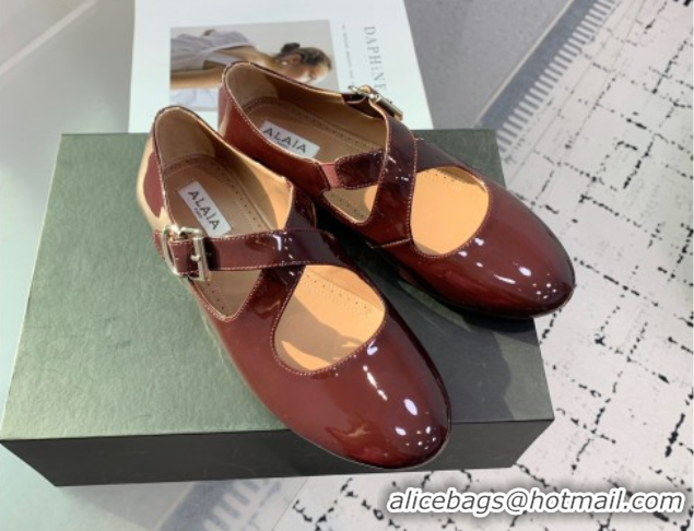 Purchase Maison Alaia Criss Cross Ballet Flats in Patent Calfskin Brown 0219012