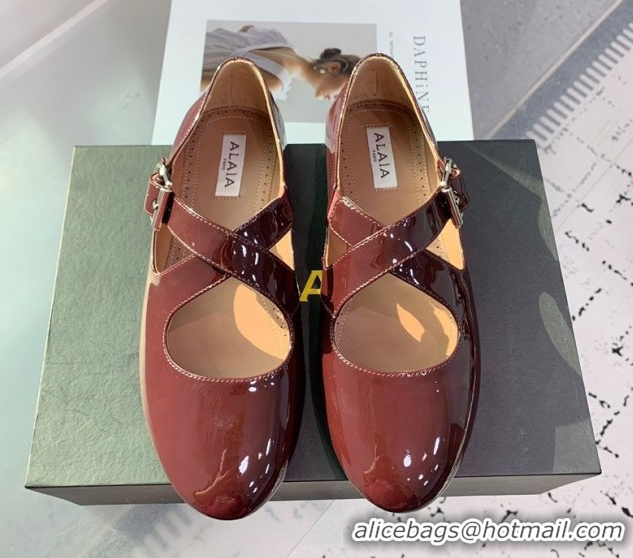 Purchase Maison Alaia Criss Cross Ballet Flats in Patent Calfskin Brown 0219012
