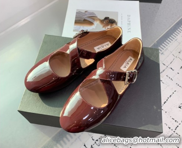 Purchase Maison Alaia Criss Cross Ballet Flats in Patent Calfskin Brown 0219012
