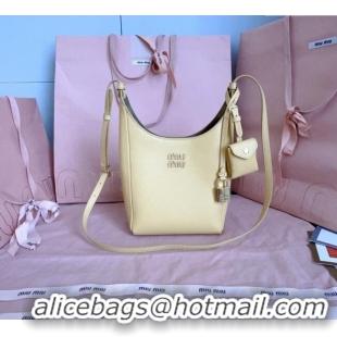 Reasonable Price Miu Miu Leather bucket bag 5BE099 Ginista Yellow 2025