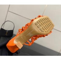 Good Quality Bottega Veneta Riva Heel Mules 9cm in Woven Knotted Leather with Frog Charm Orange 50823003