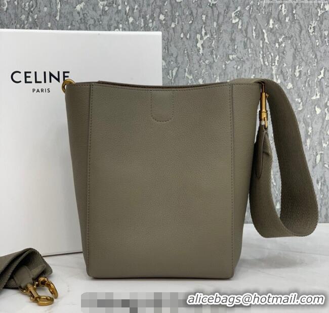 Modern Classic Celine Seau Sangle Small Bucket Bag in Supple Grained Calfskin 2088 Sage Grey 2024