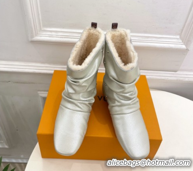 Grade Quality Louis Vuitton Nomad Flat Ankle Boots with Studs in Calf Leather Pale Gold 1AISDM 1219074