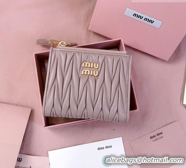 Big Discount Miu Miu Matelasse Nappa Leather Pocket Wallet 5MV017 Powder Pink 2026