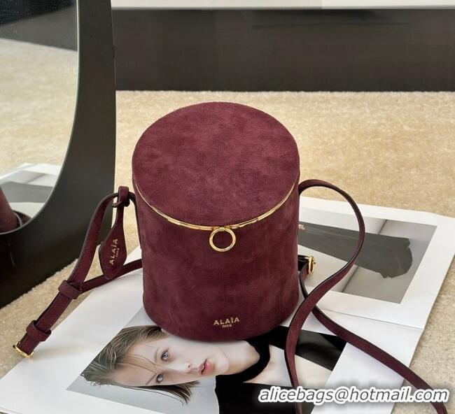 Good Taste Alaia La Canette Small Cylindrical Bag in Suede 8851 Garnet Red 2026