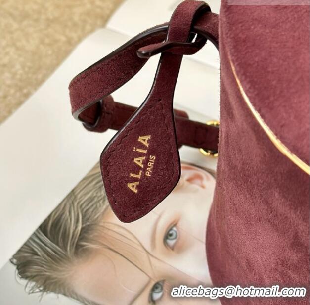 Good Taste Alaia La Canette Small Cylindrical Bag in Suede 8851 Garnet Red 2026