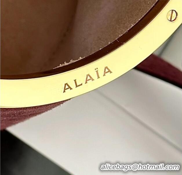 Good Taste Alaia La Canette Small Cylindrical Bag in Suede 8851 Garnet Red 2026