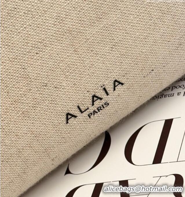 Market Sells Alaia Le Tecket Medium Long Shoulder bag in Canvas and Suede 998081 Brown 2026