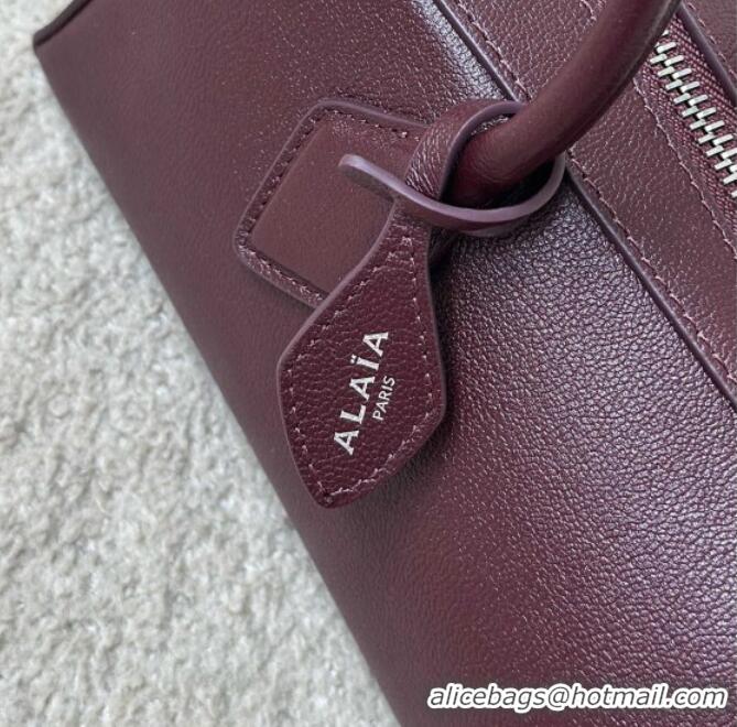 Most Popular Alaia Le Tecket Medium Long Shoulder bag in Calfskin Leather 998081 Burgundy 2026