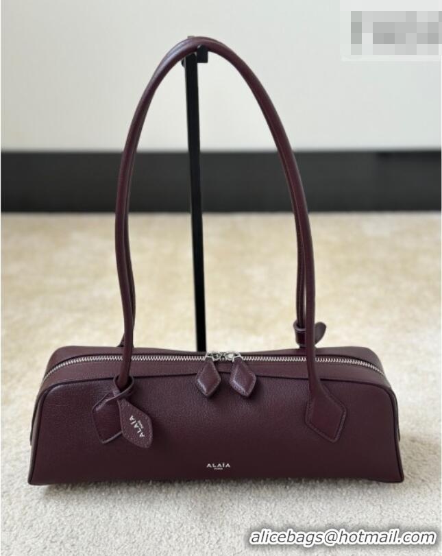 Most Popular Alaia Le Tecket Medium Long Shoulder bag in Calfskin Leather 998081 Burgundy 2026
