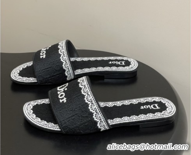 Purchase Dior Dentelle Slide Sandals in Black Dior Oblique Embroidered Cotton and White Lace 6012214 2026
