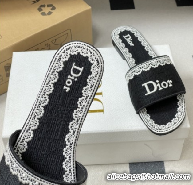 Purchase Dior Dentelle Slide Sandals in Black Dior Oblique Embroidered Cotton and White Lace 6012214 2026