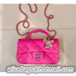 Inexpensive Chanel Lambskin Leather Mini Classic Flap Handbag With Top Handle and Bow Charm AS2431 Fuchsia 2026