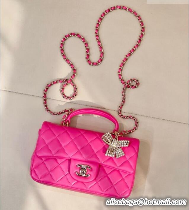 Inexpensive Chanel Lambskin Leather Mini Classic Flap Handbag With Top Handle and Bow Charm AS2431 Fuchsia 2026