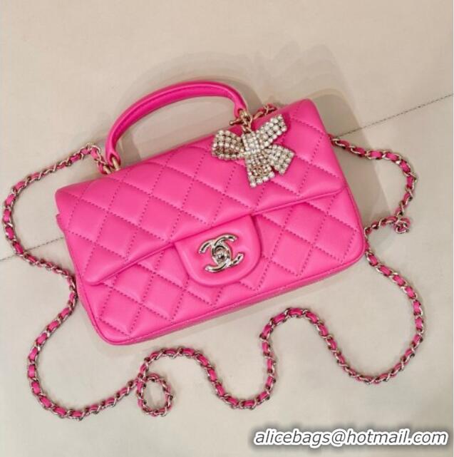Inexpensive Chanel Lambskin Leather Mini Classic Flap Handbag With Top Handle and Bow Charm AS2431 Fuchsia 2026
