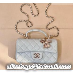 New Design Chanel Lambskin Leather Mini Classic Flap Handbag With Top Handle and Bow Charm AS2431 Light Blue 2026