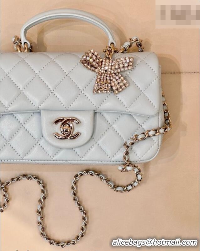 New Design Chanel Lambskin Leather Mini Classic Flap Handbag With Top Handle and Bow Charm AS2431 Light Blue 2026