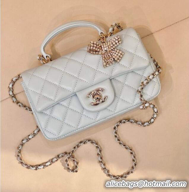 New Design Chanel Lambskin Leather Mini Classic Flap Handbag With Top Handle and Bow Charm AS2431 Light Blue 2026