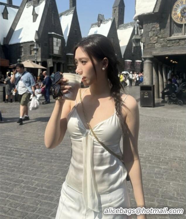 Top Grade Chanel Bow Vest CH031711 Beige 2026