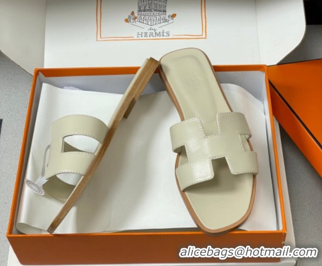 Sumptuous Hermes Oran Classic Flat Slides Sandal in Smooth Leather Beige 0304102 2026