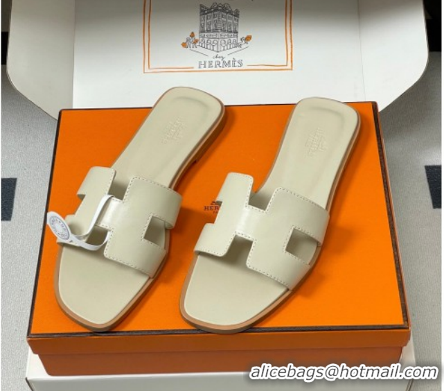Sumptuous Hermes Oran Classic Flat Slides Sandal in Smooth Leather Beige 0304102 2026