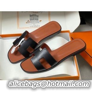 Sophisticated Hermes Oran Classic Flat Slides Sandal in Smooth Leather Black 0304106 2026