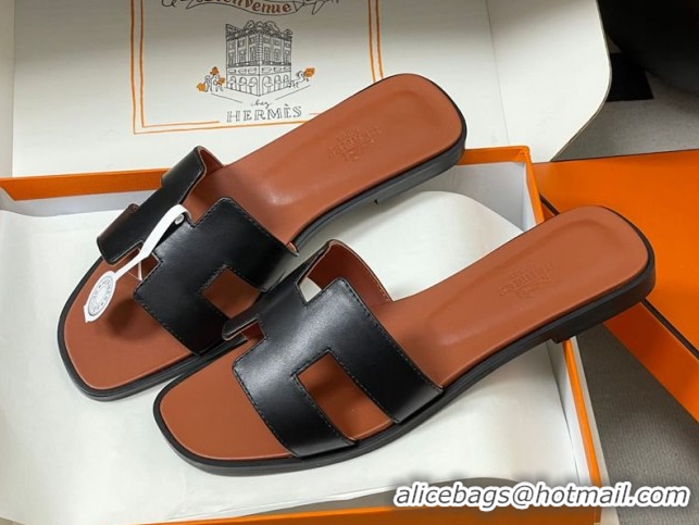 Sophisticated Hermes Oran Classic Flat Slides Sandal in Smooth Leather Black 0304106 2026