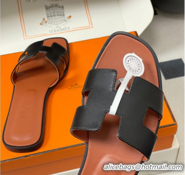 Sophisticated Hermes Oran Classic Flat Slides Sandal in Smooth Leather Black 0304106 2026