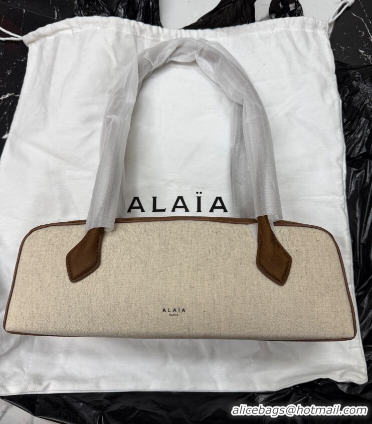 Market Sells Alaia Le Tecket Medium Long Shoulder bag in Canvas and Suede 998081 Brown 2026