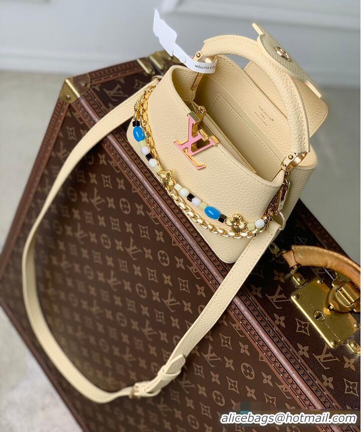 Traditional Specials Louis Vuitton Capucines East West Mini Banana Taurillon leather M25474