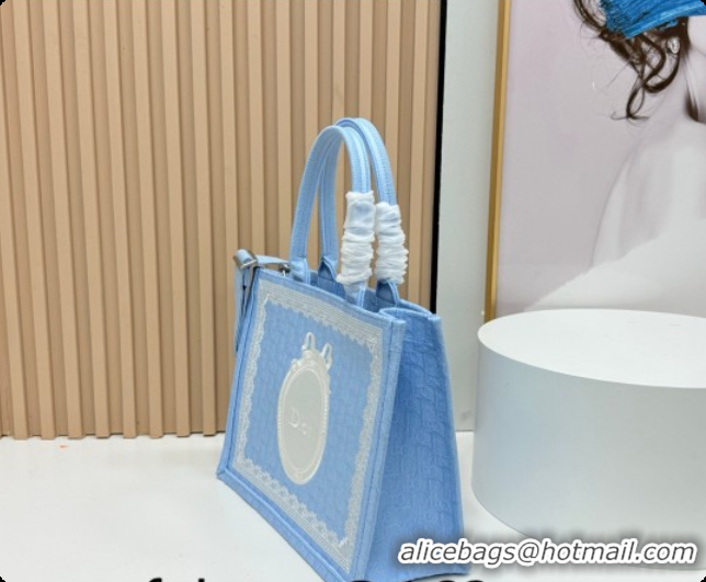 Crafted Dior Men's Medium Book Tote Bag in Céleste Blue Dior Oblique Embroidery with White Lace and Dior Médaillon 04081