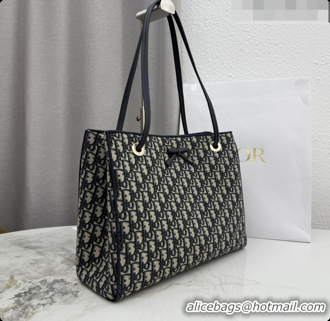 Shop Duplicate Dior Medium Dior Promenade Shopping Bag with Bow in Blue Dior Oblique Jacquard 2026 M1410